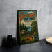 A vintage metal sign for Garrett State Forest, Maryland, featuring a scenic landscape with pine trees, a river, and hiking trails.
