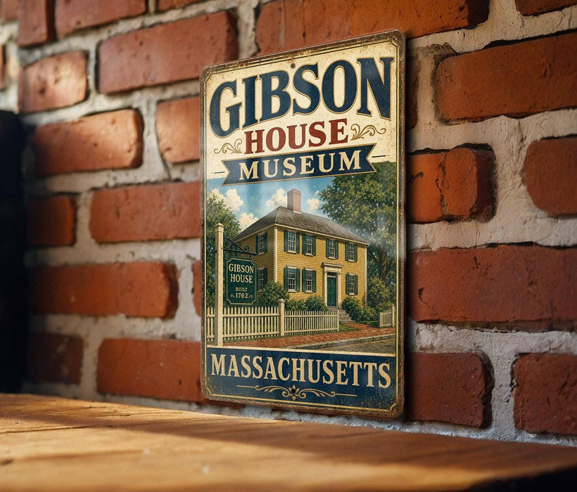 A vintage metal sign for the Gibson House Museum in Massachusetts, featuring an illustration of a yellow house with a white picket fence and a chimney.