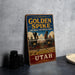 A vintage-style sign for Golden Spike National Historical Park in Utah, featuring an illustration of a steam locomotive and the text "Where the Nation Was United".