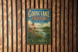 A vintage-style sign for Goose Lake Prairie, Illinois, featuring a scenic landscape with flowers and a lake.