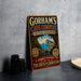 A vintage-style sign for Gorham's Cave Complex in United Kingdom, featuring a scenic illustration of the cave entrance and a message inviting visitors to explore the history and discover the cave.