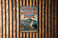 a vintage-style sign with a bird and a scenic background, mounted on a wooden wall.