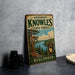 A vintage-style metal sign for Governor Knowles State Forest in Wisconsin, featuring a scenic landscape with pine trees and a lake.