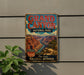 A vintage-style metal sign for the Grand Canyon National Park, featuring a scenic illustration of the canyon landscape.