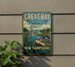 A vintage-style sign for the Great Bay National Estuarine Research Reserve in New Hampshire, featuring a blue heron and a scenic landscape.
