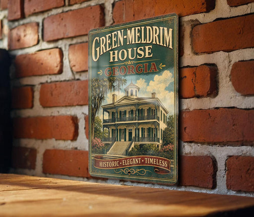 A vintage-style sign for the Green-Meltrim House in Georgia, featuring a large illustration of a historic two-story house with a wrap-around porch and a tower.