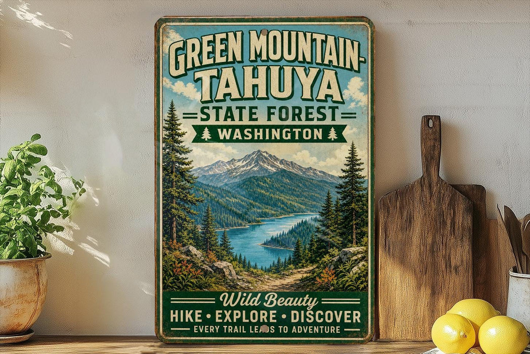 A vintage-style sign for Green Mountain- Tahya State Forest in Washington, featuring a scenic mountain landscape with pine trees and a lake.