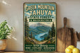 A vintage-style sign for Green Mountain- Tahya State Forest in Washington, featuring a scenic mountain landscape with pine trees and a lake.