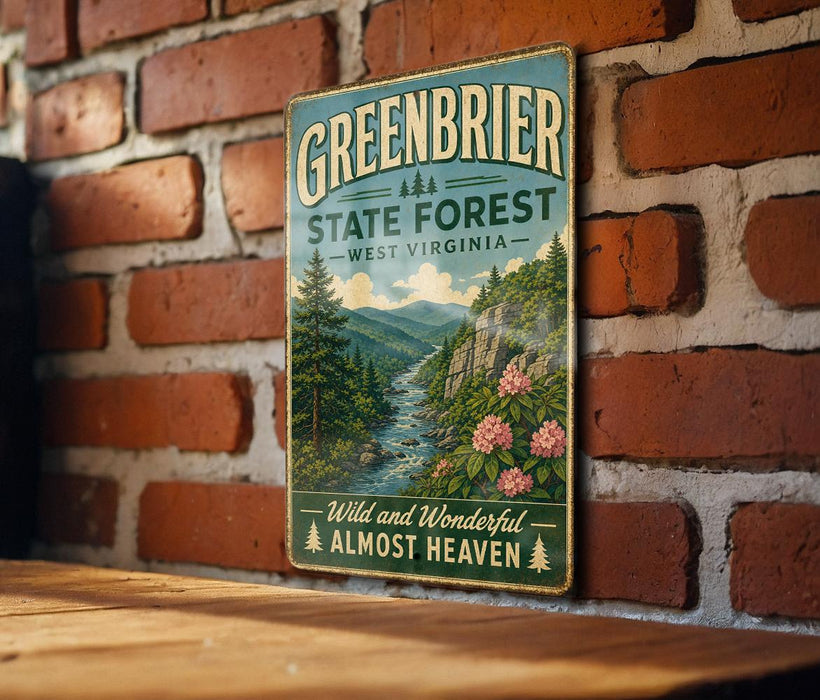 A vintage-style metal sign with the text "GREENBRIER STATE FOREST WEST VIRGINIA" and a scenic illustration of a forest landscape with mountains, trees, and flowers.