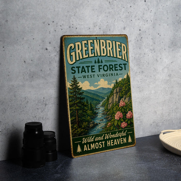 A vintage-style metal sign for the Greenbrier State Forest in West Virginia, featuring a scenic illustration of a forest and a river.