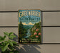 A vintage-style metal sign for the Greenbrier State Forest in West Virginia, featuring a scenic landscape with a river, mountains, and trees.