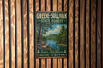 A vintage-style metal sign for Greene-Sullivan State Forest in Indiana, featuring a scenic landscape with a river and trees.