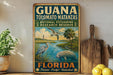 A vintage-style sign for the National Estuarine Research Reserve in Florida, featuring illustrations of various birds and wildlife in a natural setting.