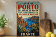 A vintage metal sign displaying the name "Gulf of Portugal" and the location "Calanché of Piana Gulf of Girolata Scandal reserve" is displayed on a shelf.