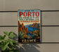 A vintage metal sign advertising the Gulf of Porto, Calanche of Piana, Gulf of Girona, and Scandalla Reserve, with a scenic mountain landscape in the background.