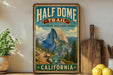 a vintage-style sign for the Half Dome Trail in Yosemite National Park, California.