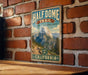 A vintage-style metal sign for the Half Dome Trail in Yosemite National Park, California, featuring a scenic mountain landscape.