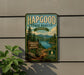 A vintage-style metal sign for the Vermont State Forest, featuring a scenic landscape with pine trees, a lake, and mountains.