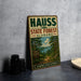 a vintage metal sign for the Haus State Forest in Alabama, with a scenic illustration of a forest and a lake.