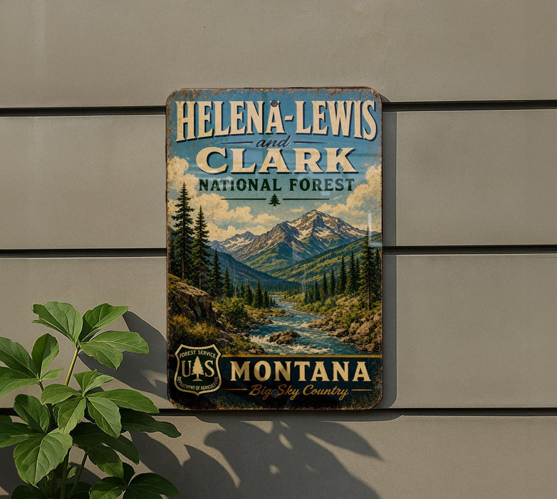 A vintage-style sign for Helena-Lewis and Clark National Forest in Montana, featuring a scenic mountain landscape with a river and pine trees.