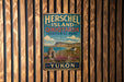 A vintage metal sign for Herschel Island, Qikiqtaruk, and Territorial Park, located in Yukon, Canada.