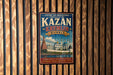 A vintage-style metal sign with the text "KAZAN KREMLIN RUSSIAN" and an illustration of a Russian palace or fortress.