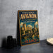 A vintage-style metal sign for the Historic Centre of Avignon, France, featuring an illustration of the Avignon Bridge and the city's architecture.