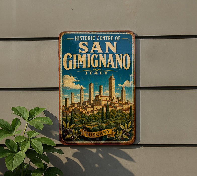 A vintage-style metal sign with the text "Historic Centre of San Gimignano Italy" and a picture of the city of San Gimignano, Italy, is displayed on a wall.