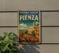 A vintage-style sign for the Historic Centre of the City of Pienza, Italy, featuring an illustration of a historic building and landscape.