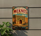 a vintage-style metal sign with the text "Historic City of Meknes Morocco" and an illustration of a building with a fountain.