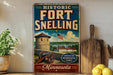 A vintage-style sign for the historic Fort Snelling in Minnesota, featuring a cannon, a building, and an American flag.