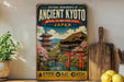 a vintage-style metal sign with a colorful illustration of a Japanese temple surrounded by cherry blossoms, placed on a wooden shelf next to a potted plant and a wooden cutting board.
