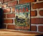 A vintage-style metal sign with the text "HISTORIC MONUMENTS OF ANCIENT NARA JAPAN" and an illustration of a temple and a Buddha statue.