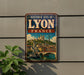 A vintage-style metal sign that reads "HISTORIC SITE OF LYON FRANCE" with an illustration of a cityscape and a bridge.