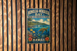 A vintage metal sign for the Honolulu-Mokulele Bay Marine Life Conservation District, featuring a tropical beach scene with a sea turtle, palm trees, and colorful flowers.