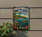 A vintage metal sign for Honolulu-Mokuleleia Bay, the Marine Life Conservation District, featuring a tropical beach scene with a sea turtle, colorful fish, and flowers.