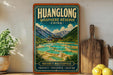 A vintage-style poster of the Huanglong Biosphere Reserve in China, featuring a scenic landscape with a hot spring and mountains in the background.