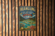 A vintage-style metal sign for the Hualong Scenic and Historic Interest Area in China, featuring a dragon and a waterfall.