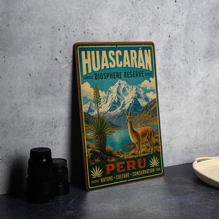 A vintage-style metal sign for Huascaran Biosphere Reserve in Peru, featuring a llama and mountainous landscape.