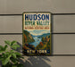 A vintage-style sign for the Hudson River Valley National Heritage Area in New York, featuring a scenic illustration of the area with a river, mountains, and a train.