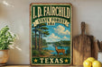 A vintage-style sign for the I.D. Fairchild State Forest in Texas, featuring a scenic illustration of a forest, a deer, and a river.