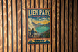 A vintage-style poster advertising Ijen Park, Indonesia, featuring a man carrying a basket and a scenic landscape with mountains and a lake.