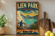 A vintage-style poster advertising Lijen Park, Indonesia, featuring a man carrying a basket of fruit and a scenic landscape with a lake and mountains.
