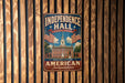 A vintage metal sign for Independence Hall in Philadelphia, Pennsylvania, featuring an illustration of the historic building and American flags.