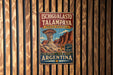 A vintage metal sign advertising the Ichigualasto Talampaya, a famous natural landmark in Argentina.