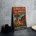 A vintage-style metal sign advertising the Ichigualasto Talampaya, a famous natural landmark in Argentina, featuring a colorful illustration of the rock formation.