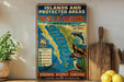 A vintage-style metal sign displaying a map of the Gulf of California and its surrounding areas, with illustrations of various marine life and a message about the importance of protecting the natural environment.