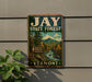 A vintage-style metal sign for Jay State Forest, featuring a scenic landscape with a river, mountains, and fall foliage.