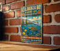 A vintage metal sign for Kealakua Bay, Hawaii, featuring a turtle swimming in the ocean and surrounded by tropical flowers.