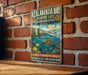 A vintage metal sign for Kealakua Bay, Hawaii, featuring a turtle swimming in the ocean and surrounded by tropical flowers.